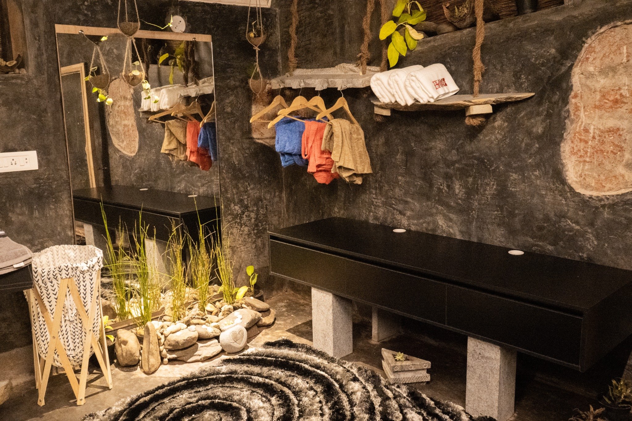 Contemporary Royal Cottage - Discover a beautifully designed rustic dressing area with handcrafted wooden furnishings, natural stone décor, indoor greenery, and premium amenities