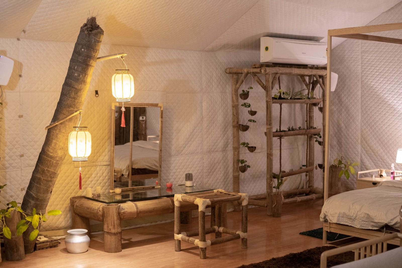 Oriental Royal Cottage - A beautifully crafted aesthetic mirror enhances the rooms elegant interiors, adding charm and sophistication to every corner.